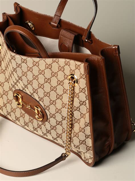 borsa gucci con occhiolni d'oro|borse Gucci da donna.